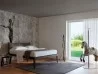 Cama Moheli en una zona de dormitorio