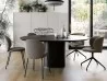 The Holo Pillar table accompanied by Dua chairs by Kristalia