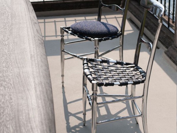 Silla Agadir Baxter | Aluminio Fundido y Piel Trenzada | Diseño Paola Navone