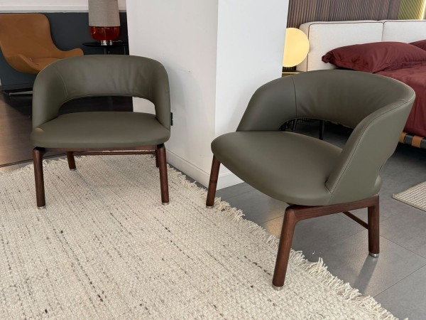 Flexform Alma lounge armchair in green leather with dark Canaletto walnut base